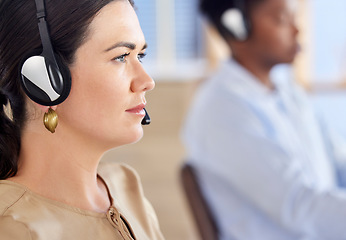 Image showing Call center, telemarketing and business woman in office workplace desk for sales communication, financial advice and crm strategy with focus. IT support, virtual advisor or consultant with headphones