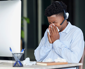 Image showing Computer, call center or sick businessman blowing nose with tissues in contact us, telemarketing or b2b sales company. Stress flu, covid or cold virus for customer support receptionist and technology