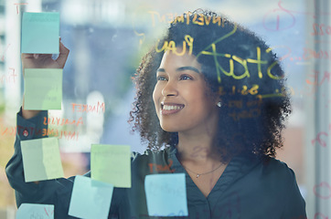 Image showing Business woman, planning and writing with sticky note, glass and strategy for marketing research in advertising company. Corporate worker, happy and innovation plan, analytics and company vision