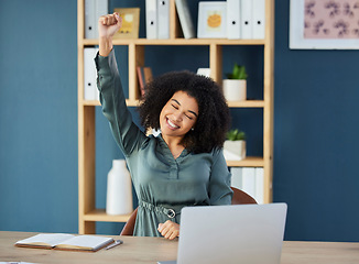 Image showing Business woman, laptop and success fist in winner celebration, digital marketing goals or advertising growth target achievement. Smile, happy or creative black woman with arm raised with technology