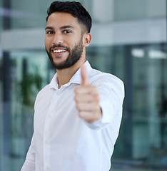 Image showing Thumbs up, success and businessman with a thank you, smile and marketing of a corporate company. Winner, agreement and portrait of an employee with hand sign for an advertising startup agency