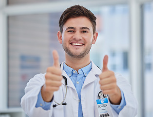 Image showing Man, doctor or thumbs up in hospital for support, trust and life insurance vote for healthcare wellness, medical help or surgery success. Portrait, smile or happy medicine worker with approval hands