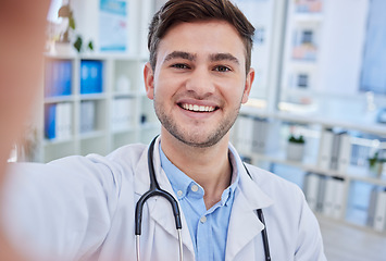 Image showing Selfie, doctor and happy healthcare nurse in hospital office for consultation. Man, gp medical worker and professional cardiology therapist working or smile for photograph on phone in medic clinic