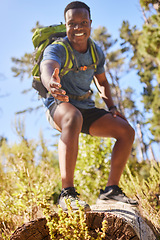 Image showing Black man, hiking and help hand, smile and happy outdoor in nature, forest or nature park in summer. Climbing up hill, trekking together in nature and healthy workout adventure, pov and fitness hiker