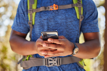 Image showing Hiking, hands and phone of backpacker browsing 5g gps directions in nature for fitness and exercise adventure. Cellphone, hiker and freedom online for backpacking explore in a natural environment