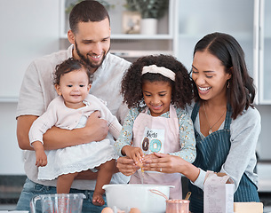 Image showing Family, learning and girl cooking in kitchen, bonding or having fun in home. Care, love and support of parents, father and mother, baby and kid baking, crack egg and enjoying quality time together.