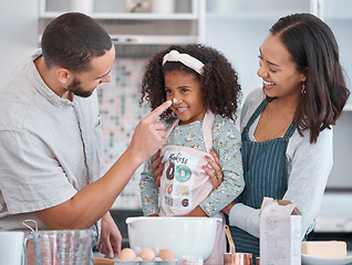 Image showing Family, happy and cooking flour face fun with caring dad, mother and cute daughter in home kitchen. Wellness, baking and fun parents bonding with young child chef learning recipe in Mexico.