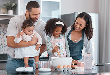 Image showing Mother, father and children in kitchen baking with smile on face and help cooking together. Family, fun learning and teaching girl to bake, man and woman with happy kids family home in New Zealand.