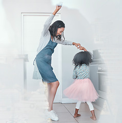 Image showing Mother, dance and ballet with her child for fun while cooking or baking in the family home kitchen. House, fun and woman and little girl dancer for artistic, silly and goofy fun time as they cook