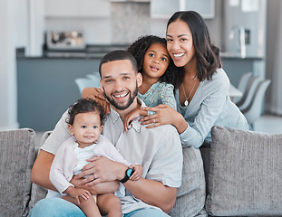 Image showing Happy family, portrait and home with mother, father and children together in the living room at home for love, care and happiness. Smile of a black man, woman and kids in their Puerto rico house