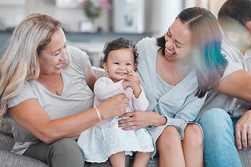 Image showing Family, love and baby with a mother, grandmother and infant girl bonding on a sofa in the living room of a house. Mothers day, children and visit with a female toddler, woman and daughter at home