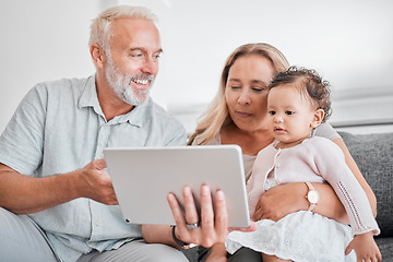 Image showing Family, tablet and baby with grandparents on sofa in home on social media, streaming movie or educational app. Relax, love and grandpa, grandma and infant or child with touchscreen tech for cartoons.