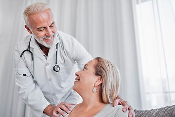 Image showing Support, healthcare and doctor with woman in home for checkup, health exam or test. Consultation, wellness and mature patient consulting medical worker on sofa in living room with trust and empathy.