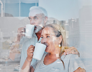 Image showing Elderly couple, hug and drinking coffee by window of the city with a vision for morning routine at home. Senior man and woman relaxing looking out glass at urban town view together with warm mug