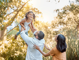 Image showing Family, nature and girl in air for lift, love and support bonding together. Happy, excited kid and parents, happiness and relax or child development lifestyle for quality time in nature outdoor
