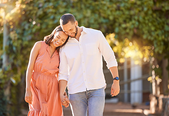 Image showing Couple, holding hands and bonding with love in a garden or park in summer for romantic relationship. Man, woman and girlfiend or boyfriend bond for freedom and carefree loving time in a yard