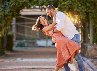 Image showing Happy couple, dance and love in park, garden and sunshine for bonding, quality time and romantic date together. Smile, dancing and fun man, woman and partner, freedom and happiness outdoors in summer