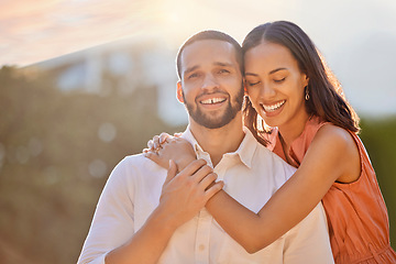 Image showing Love, sunshine and portrait of couple in park enjoying summer holiday, vacation and weekend. Bonding, affection and happy young man and woman hugging, embrace and smiling together on romantic date