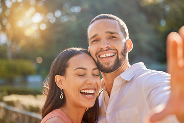 Image showing Couple, funny selfie and happiness while outdoor in summer on vacation for love, care and memory or profile picture for social media. Portrait of a happy man and woman in nature for a romantic date