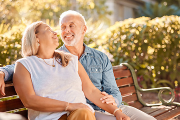 Image showing Senior date, love and couple with care in park for peace, relax and calm during retirement. Smile, affection and elderly man and woman in the backyard or garden of a home for conversation on a bench