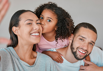 Image showing Family, portrait and selfie with child, mother and father together at home for kiss, love and care with smile and happiness. Child, man and woman in Puerto Rico house for social media profile picture