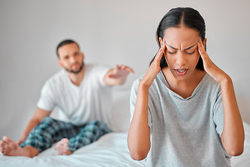 Image showing Couple, fight and stress in bedroom with man and woman arguing about cheating affair. Argument, conflict and divorce with a husband and wife frustrated with relationship problem in the bedroom