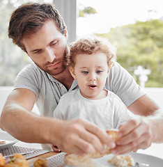 Image showing Feeding, lunch and child eating bread with father and hungry together with food at the dining room table. Dinner, meal and dad with breakfast for baby in the morning in their family house with love