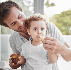 Image showing Meal, father and baby eat lunch with smile, love and happy together in Germany. Portrait, food and child eating bread for nutrition, health and hungry on a lunch in dining room, house or family home