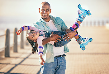 Image showing Family, children and roller skating with a father and daughter on the promenade at the beach during summer. Kids, love and sports with a man and girl bonding together on roller skates for a hobby