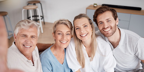 Image showing Selfie, parents and young couple in the living room of their house for love, smile and happy during a visit. Happiness, content and portrait of a senior man and woman with adult children for a photo