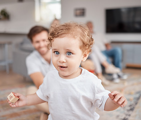 Image showing Baby, learning and walk in family home with toys, education and parents in living room. Child, infant and walking with happy family, happiness and balance on floor, carpet and blurred background