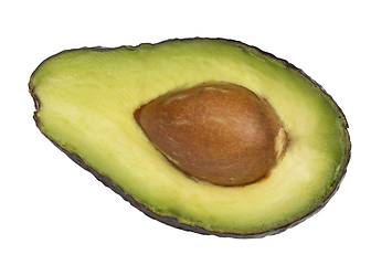 Image showing Avocado fruit cut in half with seed