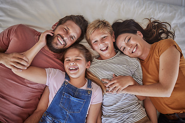 Image showing Family, bed and happy portrait above in morning bonding, love or care for children in family home. Mom, dad and kids in bedroom with happiness, holiday or vacation to rest, relax or smile together