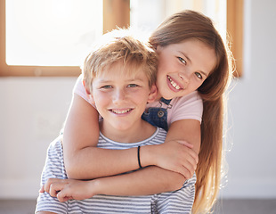 Image showing Family, hug and portrait of girl an boy in a living room, bonding and happy while enjoying quality time together. Face, happy family and sibling brother and sister embrace, playful and relax at home