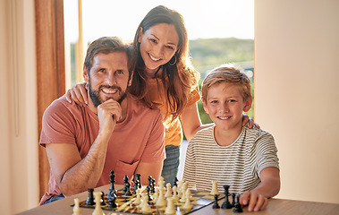 Image showing Family, chess and home youth brain development of a mother, father and child with a game. Happy kid and parents portrait with love and care ready for problem solving and knowledge board game