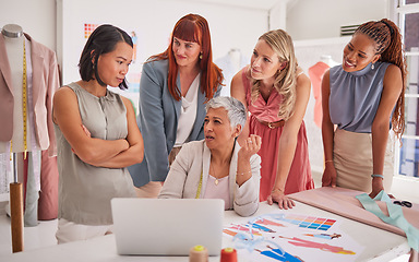 Image showing Business people, fashion and design in collaboration for planning, strategy or ideas on laptop at the office. Group of employee designers in business discussion for clothing, marketing or advertising