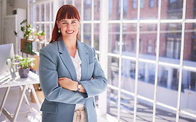 Image showing Business woman, portrait smile and arms crossed for vision, ambition or career success at the office. Happy female leader or manager smiling for successful corporate design or company startup at work
