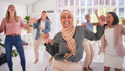 Image showing Business women, dance and success, diversity and teamwork, happy celebration and achievement, goals and winner dream. Collaboration, energy and excited employees dancing with muslim manager in hijab