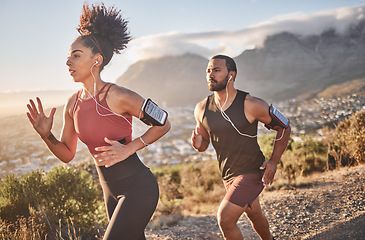 Image showing Fitness, exercise and black couple running for cardio health on mountain road for speed, energy and wellness. Man and woman runner listen to music outdoor for workout and training for marathon race