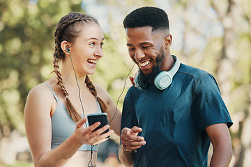 Image showing Phone, music and fitness with a diversity couple listening to audio while outdoor for running exercise together. Happy, fun and streaming with a man and woman athlete outside for a training workout