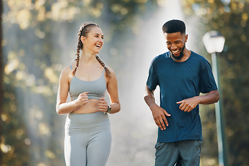 Image showing Couple, running and fitness communication in nature park for exercise wellness or interracial training workout. Health conversation, runner motivation and diverse friends, talking on cardio run