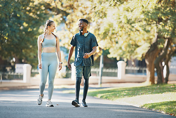 Image showing Workout, fitness and couple walk in nature together for wellness, bond and health in summer. Exercise and healthy lifestyle of people in interracial relationship walking in New York park.