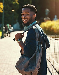 Image showing Black man, student on campus for university in outdoor portrait, education and study with backpack. College, smile and higher education with learning for development and scholarship, going to class.