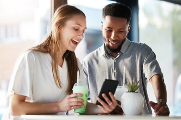 Image showing Diversity, couple and phone in cafe for social media, content creation or happy streaming online video. Mobile phone, interracial friends and funny internet communication on smartphone in coffee shop