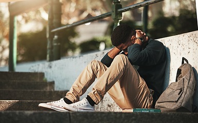 Image showing Depression, anxiety and African student sad about college fail, stress and mistake on campus. Mental health, education and black man with fear, angry and depressed about scholarship problem at school