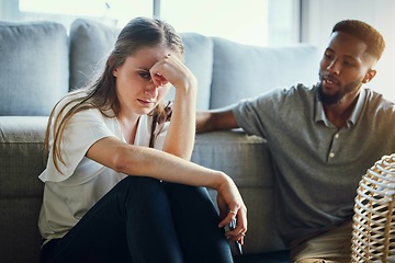 Image showing Stress, divorce and couple in living room after a fight, argument or conflict in the marriage at home. Sad, depression or woman with a worried and tired partner cheating thinking of breakup in house