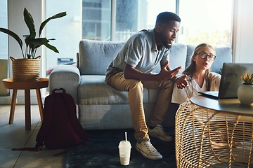 Image showing Couple, laptop and debt while on living room couch talking about remote work, bill or email with home wifi. Interracial man and woman having conversation about student results on website for learning