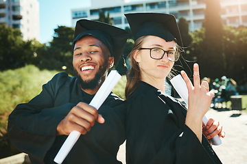 Image showing Graduation, students and happy for success, achievement or silly together outdoor. Portrait, man and woman smile, for completed degree and in gown for education, certificate and diploma at university