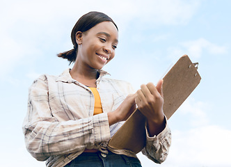 Image showing Agriculture, happy farmer or black woman with clipboard for business checklist, success or analysis growth in farm with smile. Eco sustainability, blue sky or agro woman writing or stock management.