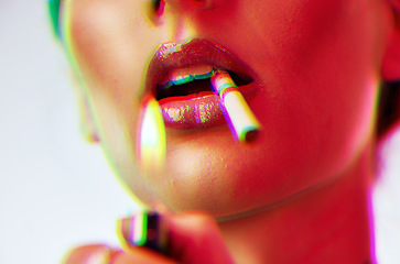 Image showing Beauty, cigarette and lighter with a woman smoking tobacco in studio with neon lights, makeup and mouth. Cosmetics, addiction and face of aesthetic model with flame to light and smoke product